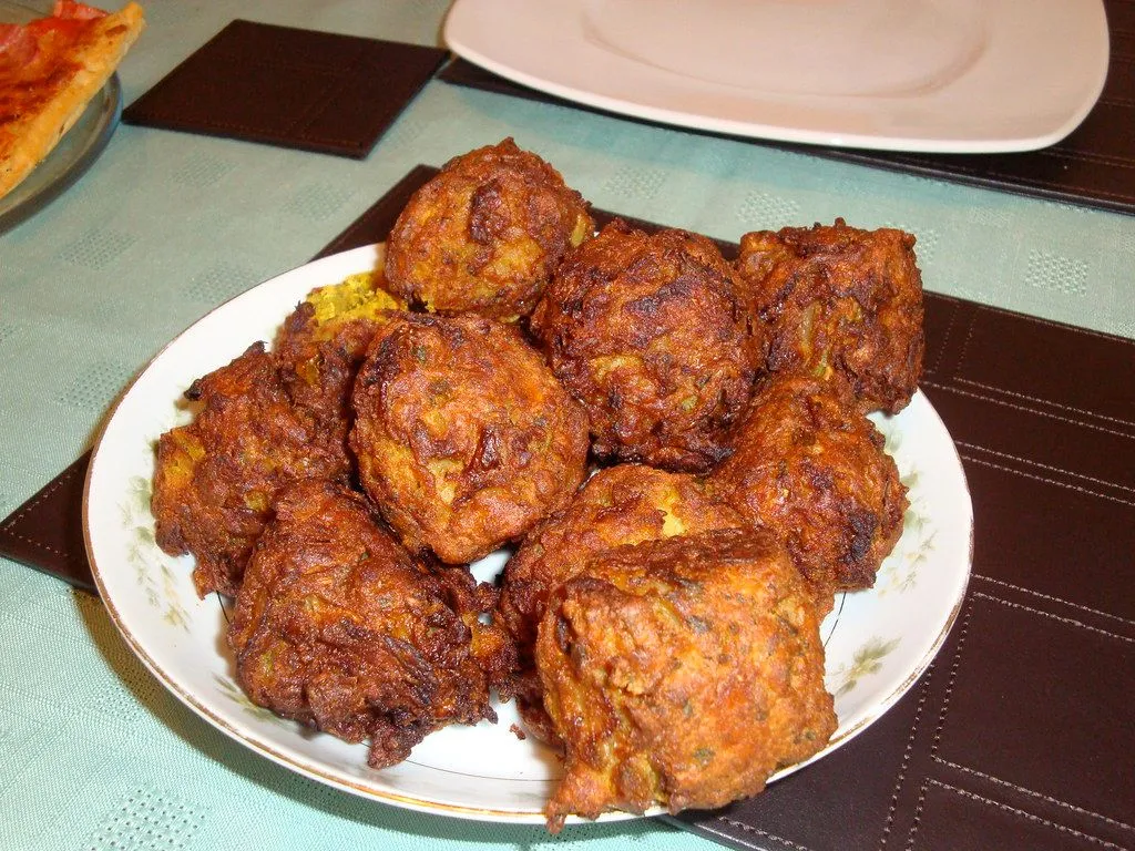 A plate of crisp, golden onion bhajis